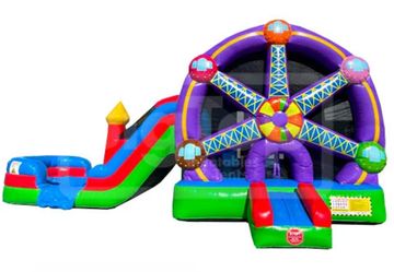Colorful inflatable Ferris wheel bounce house with slide for kids.