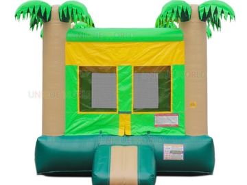Inflatable bounce house with palm tree design, bright green and yellow colors.