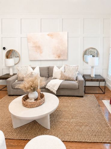 Cozy modern living room with neutral tones and natural textures.