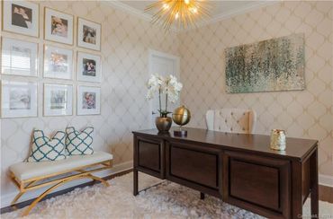 Contemporary home office with a mix of textures and patterns.