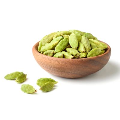 Fresh green cardamom pods with strong aroma and flavor.