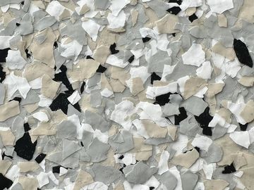Close-up of peeling paint in various colors.