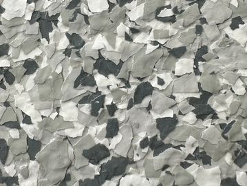 Close-up of gray and white paint chips.