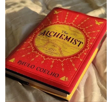 The Alchemist is the magical story of Santiago, an Andalusian shepherd boy who yearns to travel in s