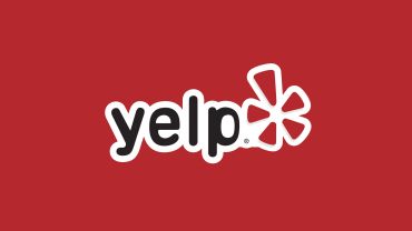 Yelp logo on a red background.