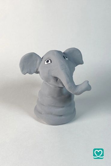 Elly the Elephant
Hand-sculpted and soulful. With her unique tiered body and curious, upturned trunk