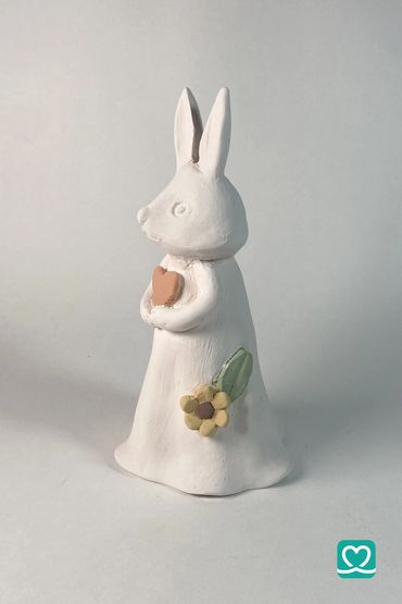 Heart Hug Blossom  Bunny 🐰 Bell
A small artisan bell featuring a bunny embracing a heart.
