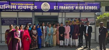 Group photo of teachers and students outside St. Francis' High School in Pune.