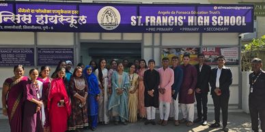 Group photo of teachers and students outside St. Francis' High School in Pune.