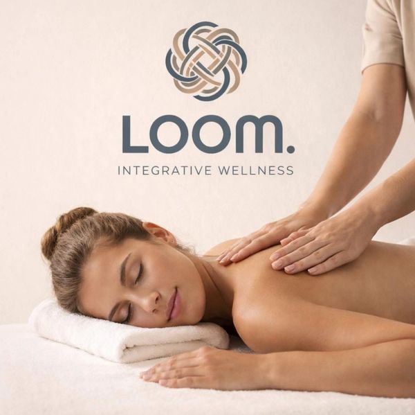 Woman receiving a relaxing shoulder massage at Loom Integrative Wellness.