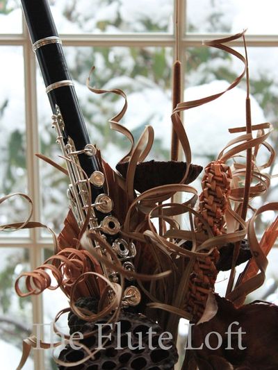 Explore Di Zhao’s professional handmade grenadilla wood flutes, expertly crafted.