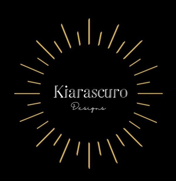 Elegant logo with golden rays and the text 'Kiarascuro Designs' on black background.