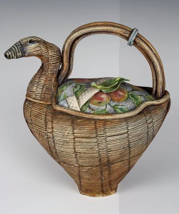 picnic goose teapot 9”h x 7”w x 3”d
