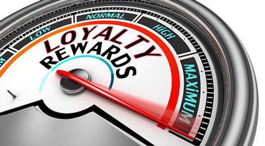 Compass with the words Loyalty Rewards and the needle pegged on Maximum
