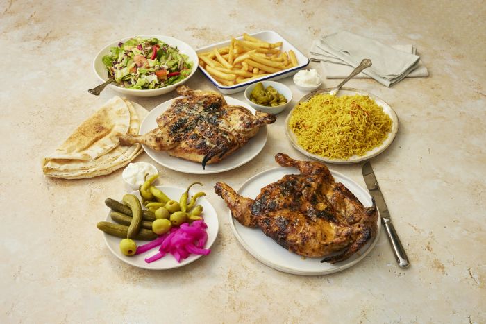 The full banquet: mezze, charcoal chicken, mixed skewers, lamb mansaf and sides