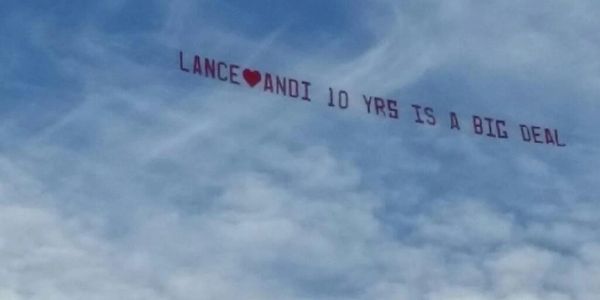 A sky banner reads: LANCE❤️ANDI 10 YRS IS A BIG DEAL.