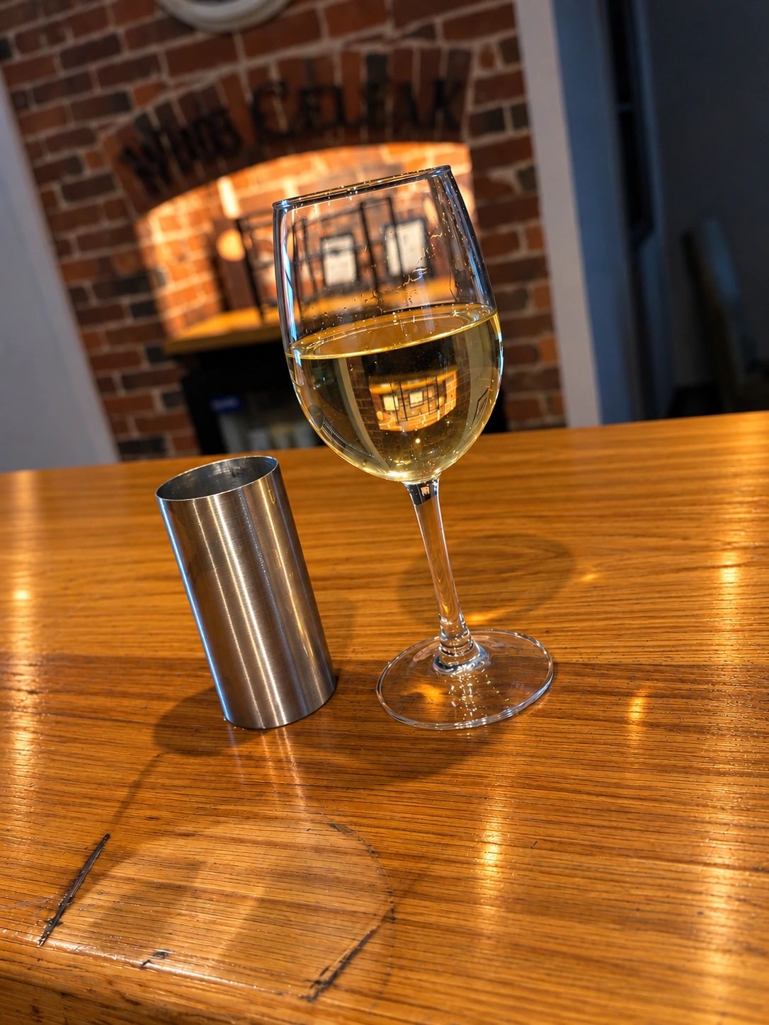 A table set with a glass of wine