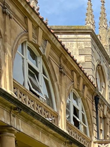 The Roman Baths, preserved in the town of Bath, with natural spring waters.