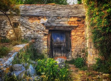 An old stone house on Korcula, deserted but colorful.