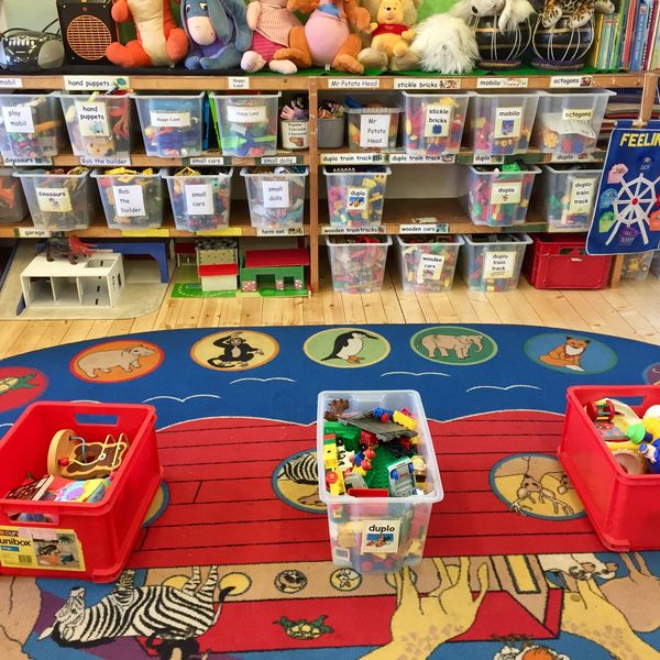 The playgroup main room toys on their shelves.