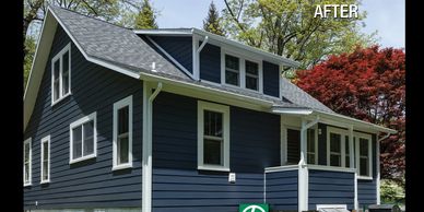 House with deep blue fiber cement siding