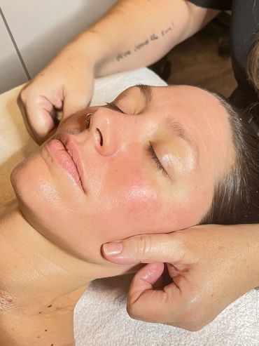 Facial Massage during an Elite Custom Facial - at AfterGlow Elite Spa in Vineland Ontario (GTA) 