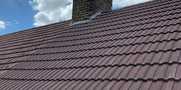 Re roof completed in London, Redland 49 concrete interlocking tiles 
