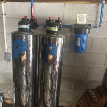 Plumber installing a new water heater in a Mount Juliet, TN home.