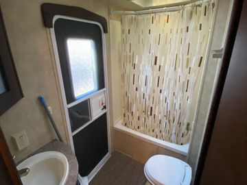 Full Bathroom with a separate entrance from the outside. 