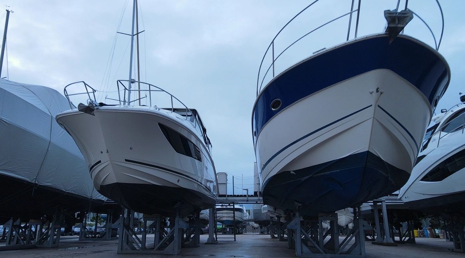 Recreational boats on the hard stand at Mackay Marina Village Hard Stand, awaiting inspections.