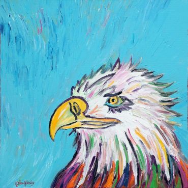 Colorful painted eagle head with sky background.