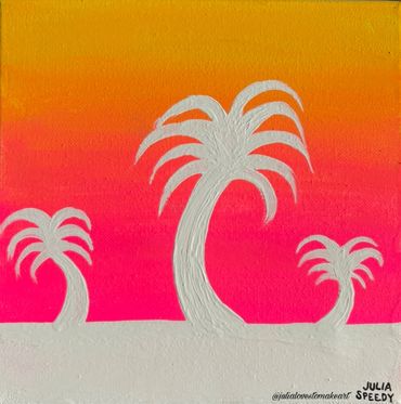 Snowy palm trees in a sunrise