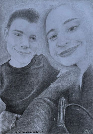 A detailed pencil sketch of a smiling young couple.