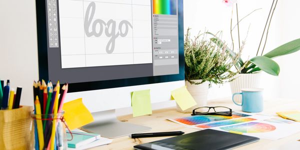 Computer design creating a logo