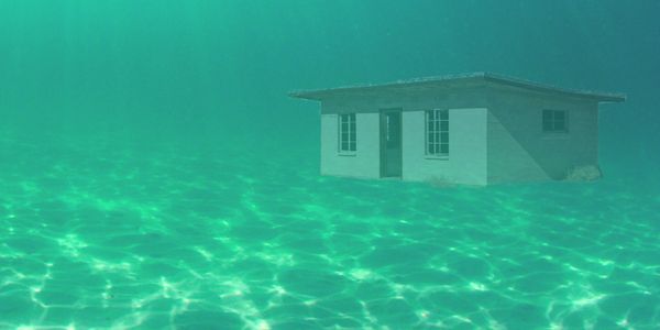 House underwater Metric Plankton, a house underwater with green tint