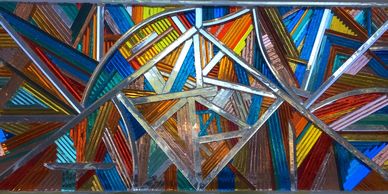 Artistic glass panels displaying stained glass works in Santa Fe, NM