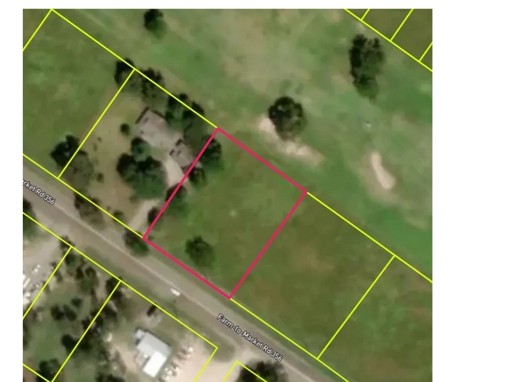 Aerial view of a property outlined in red on Farm-to-Market Rd 356.