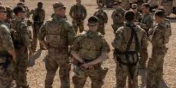 Soldiers conducting an after-action review