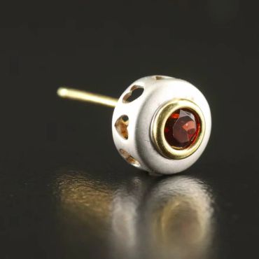 Close-up of a decorative stud earring.