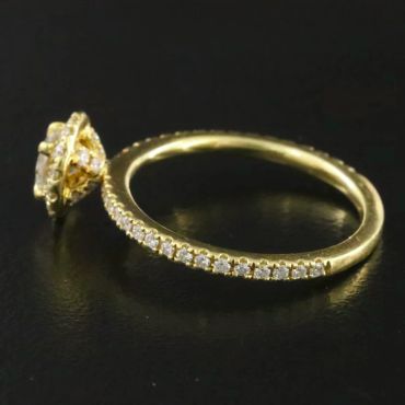 Elegant gold ring with diamond accents.