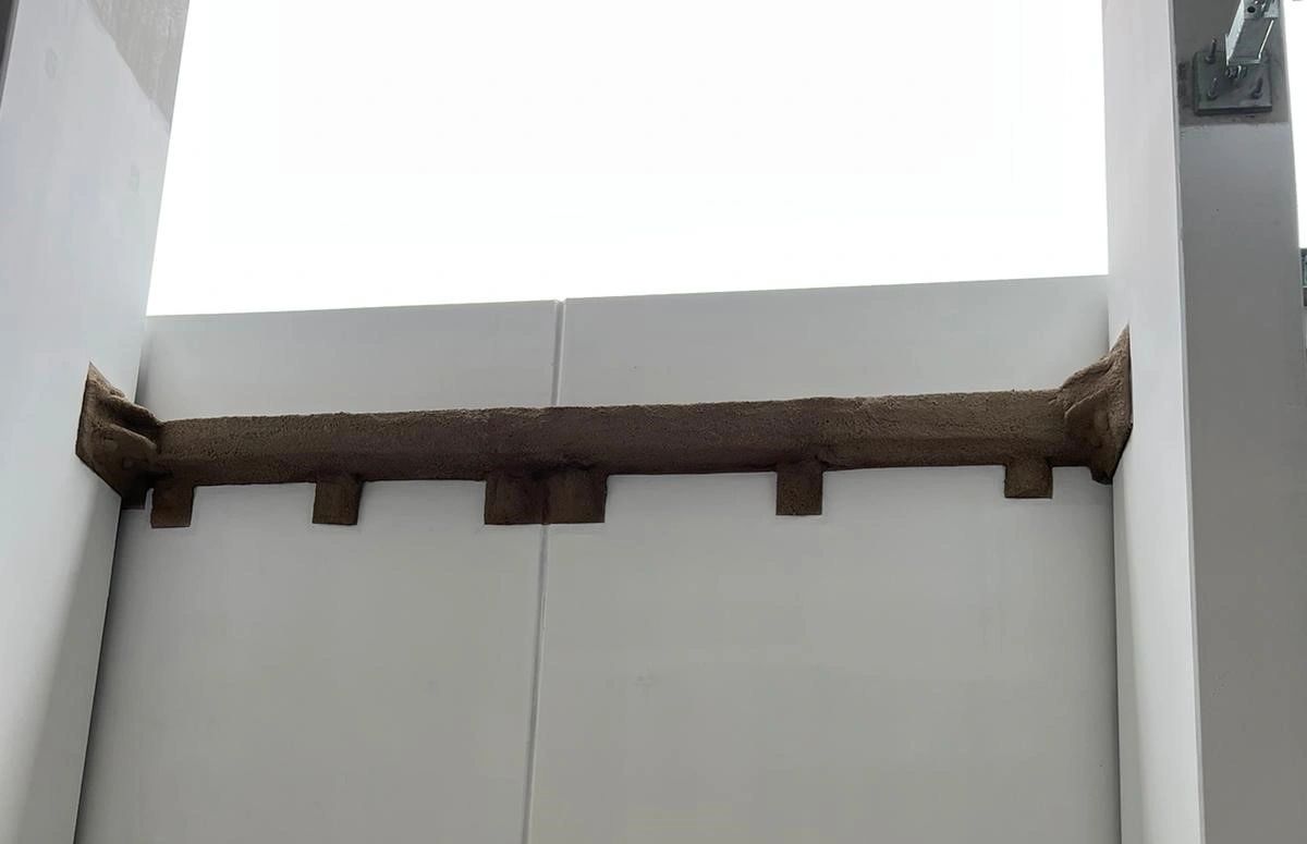 Vermiculite Spray applied to steel beam