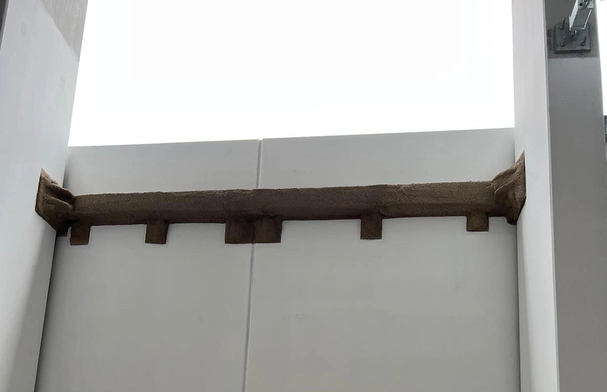 Vermiculite Spray applied to steel beam Vermiculite Spray applied to steel beam