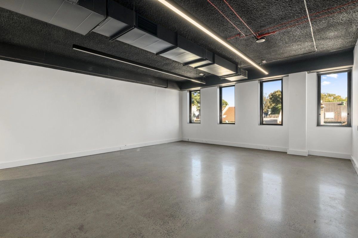 Slab FRL upgrade in an office building using a vermiculite ceiling, painted black