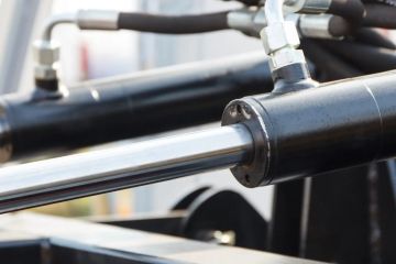 Close-up of a hydraulic cylinder.