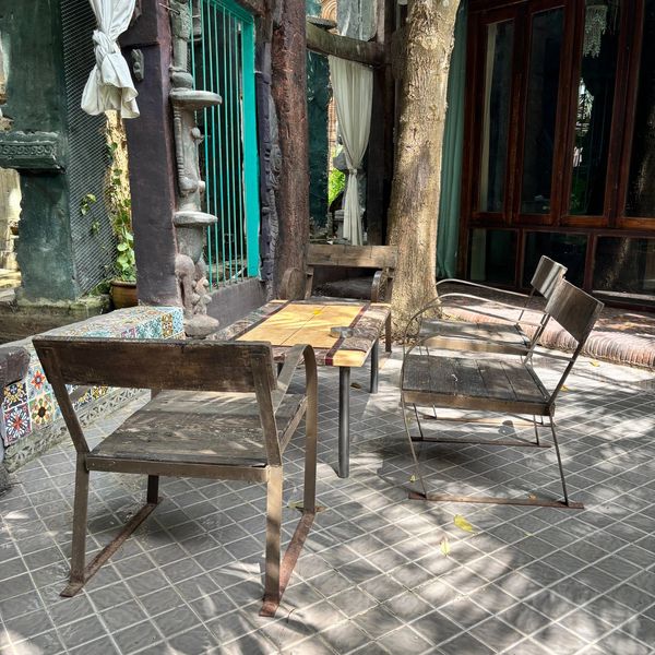 Table and chairs outside a villa