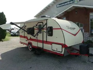 Color Crimson exterior and Crimson interior.
Huge rear bath with glassed shower two cabinet storage 