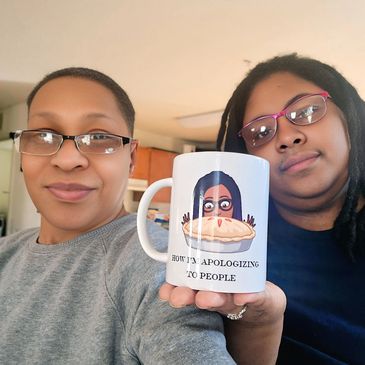 Staff holding a product.