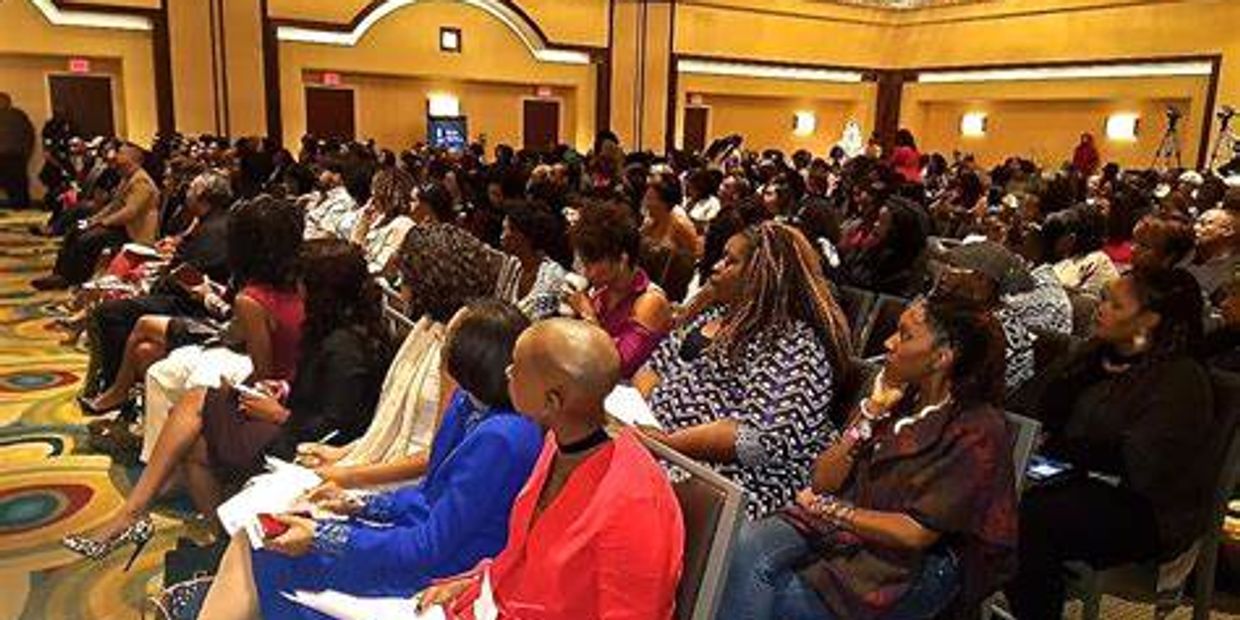 Audience of attentive people attending a training