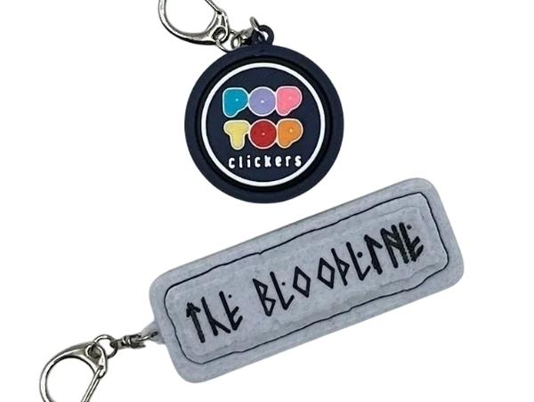 Two fidget clickers: one is the logo of the site and the other is a custom logo