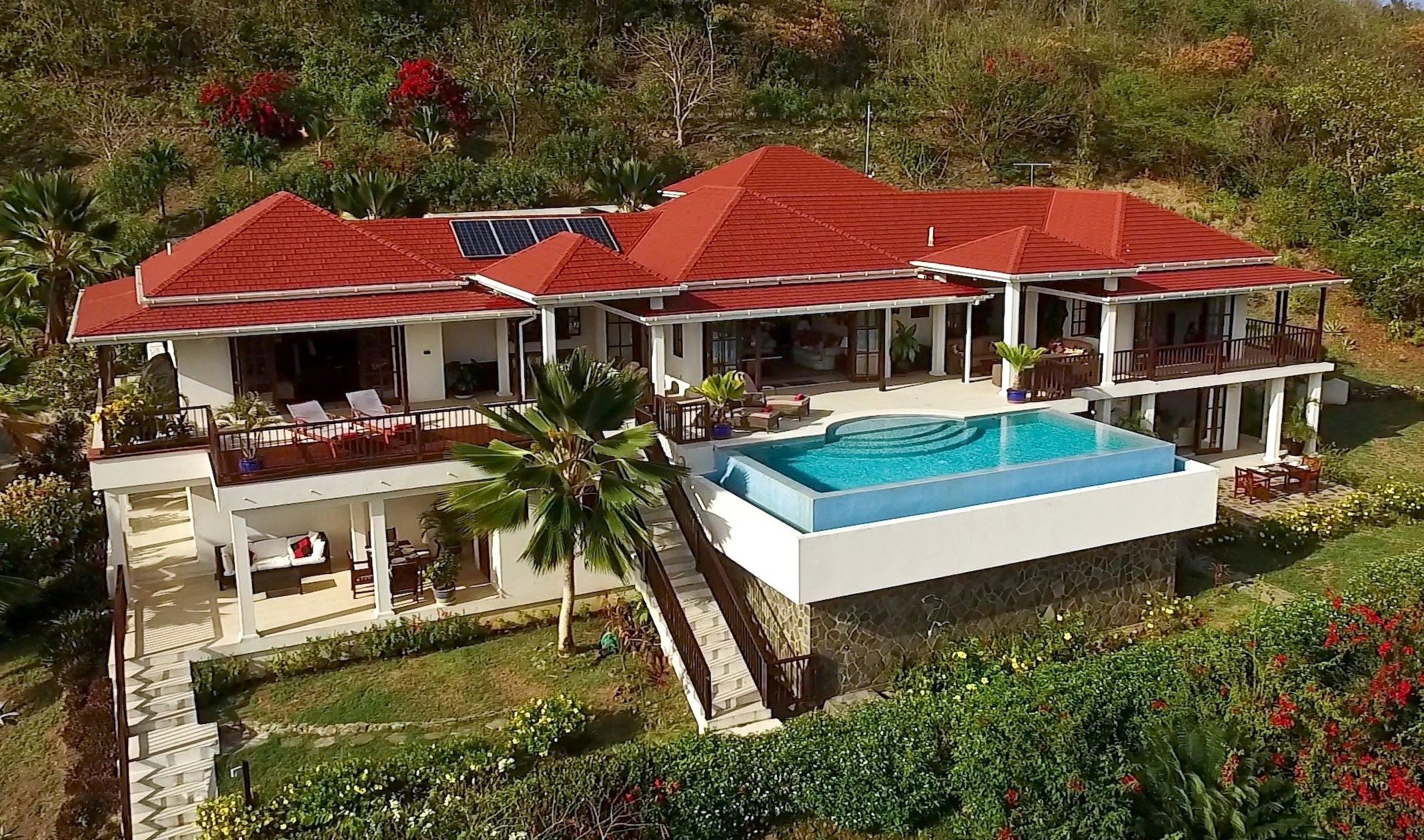 Luxury beachside plantation style Caribbean villa with wonderful views to Mustique Bequia Grenadines